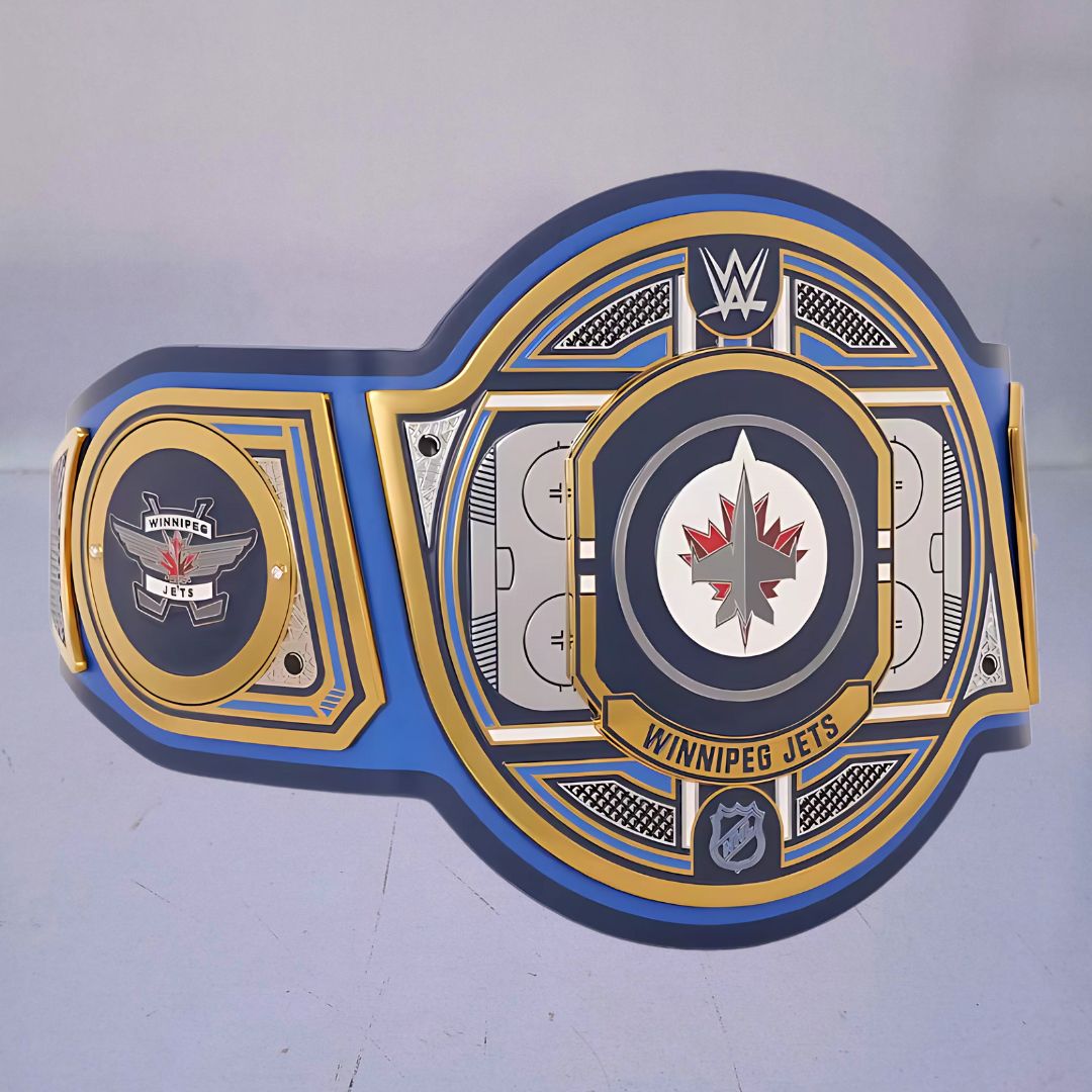Close-up of the Winnipeg Jets WWE Championship Belt, showcasing blue, white, and red accents.