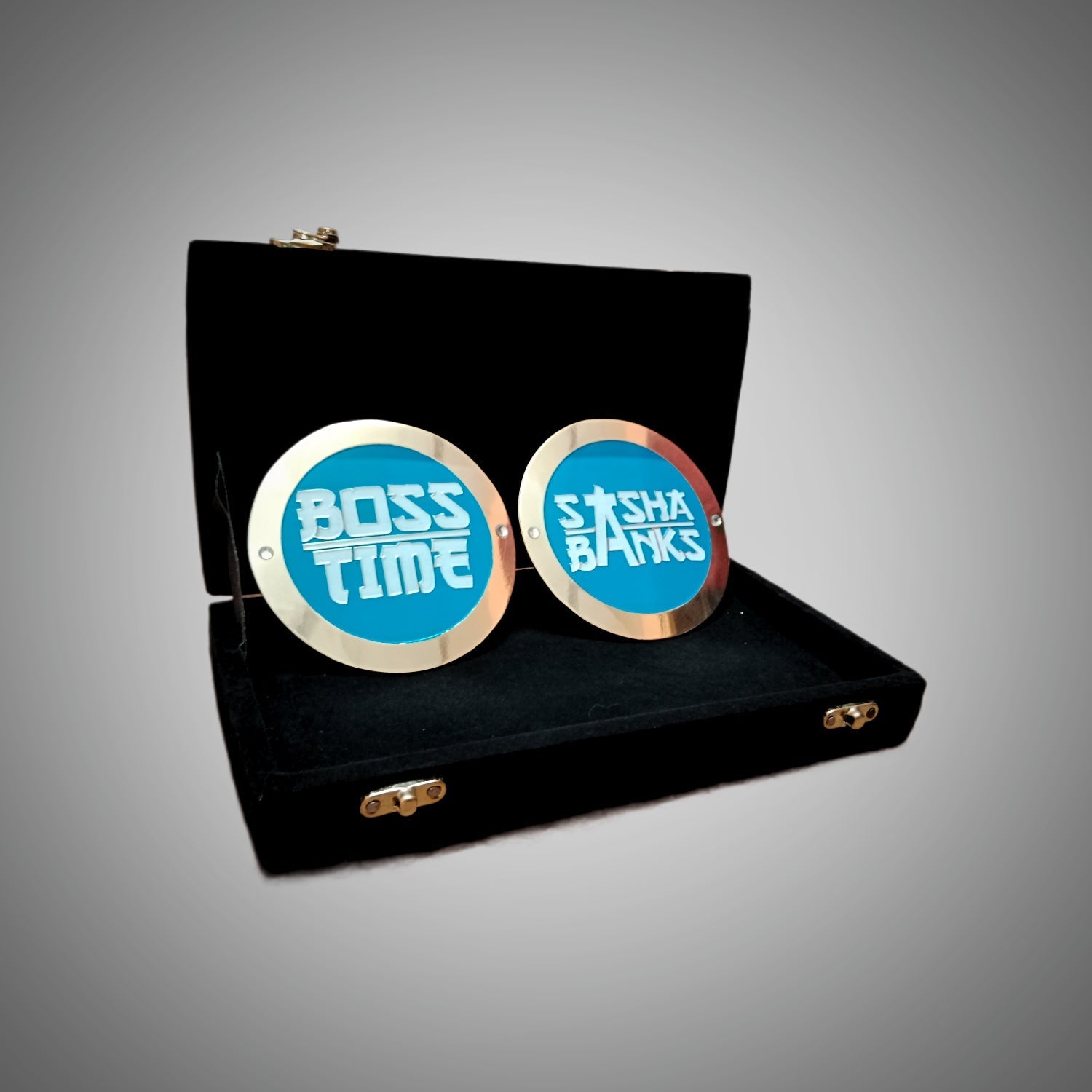 Sasha Banks side plates for WWE Championship belt.