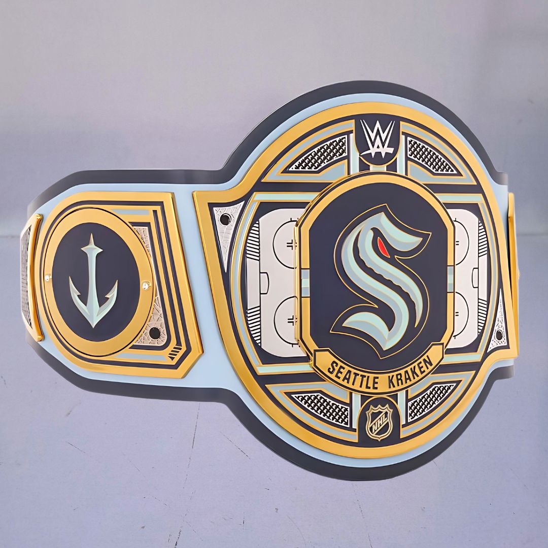 Close-up of the Seattle Kraken WWE Championship Belt, showcasing navy and teal accents.