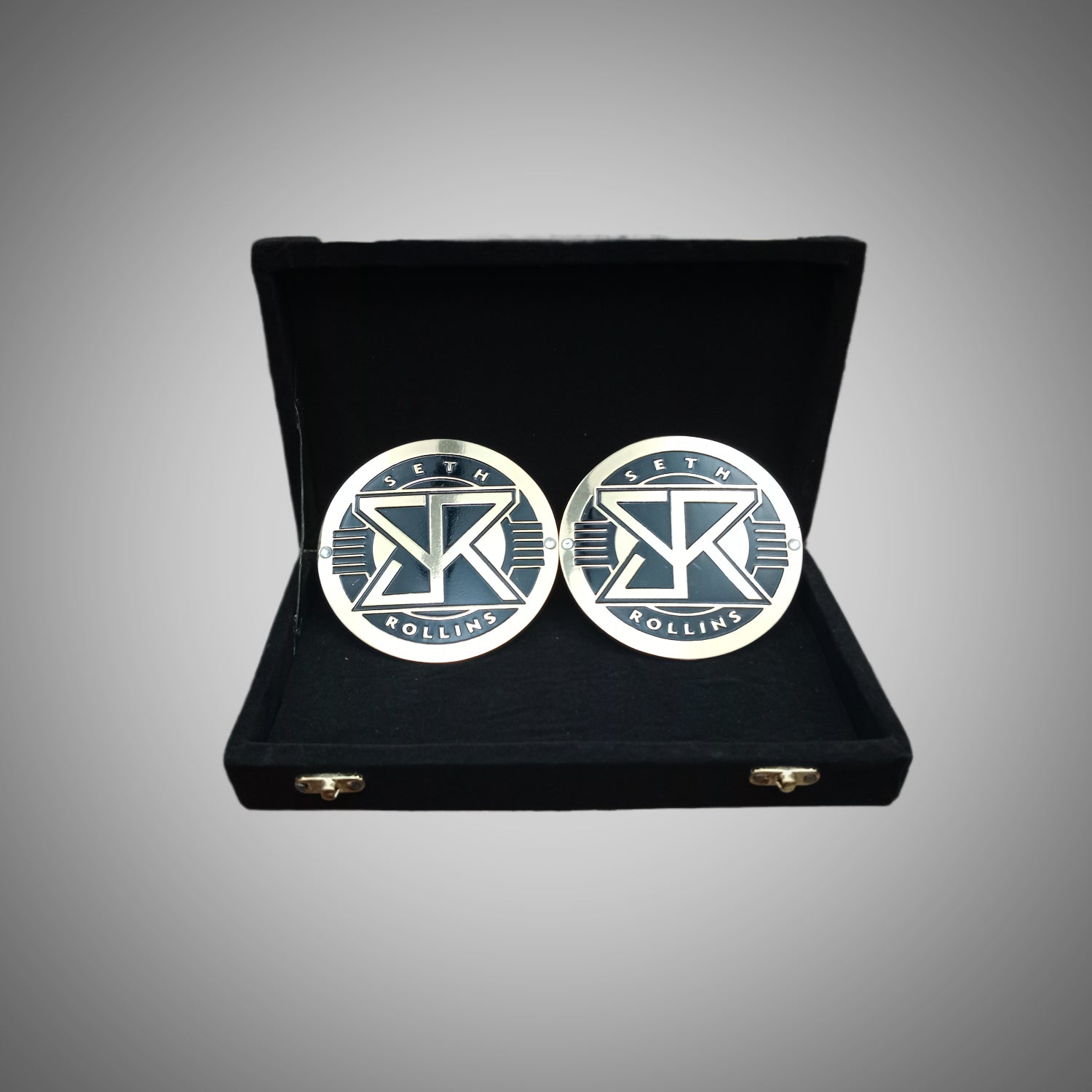 WWE championship title box set featuring Seth Rollins side plates.